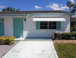 Foreclosure in  DESERT CANDLE CIR Lehigh Acres, FL 33936