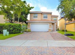 Foreclosure in  CRESCENT CREEK DR Pompano Beach, FL 33073