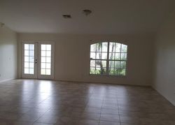 Foreclosure in  NW 27TH PL Cape Coral, FL 33993
