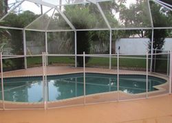 Foreclosure Listing in SW SUNDEW CT PALM CITY, FL 34990