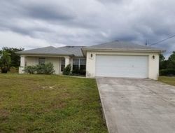 Foreclosure in  NW JUANITA PL Cape Coral, FL 33993