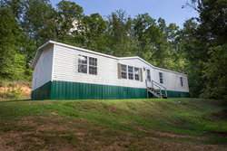 Foreclosure in  MOORE RD NW Charleston, TN 37310