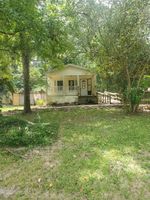 Foreclosure in  DRIFTWOOD DR Goodrich, TX 77335