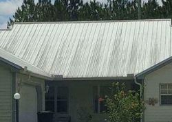 Foreclosure in  BRUNSWICK LN # A Palm Coast, FL 32137