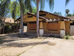 Foreclosure in  E LOWE AVE Fresno, CA 93702
