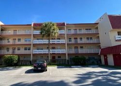 Foreclosure in  COUNTRY CLUB DR  Pompano Beach, FL 33063