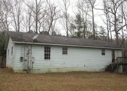 Foreclosure in  CAMP WINNATASKA RD Pell City, AL 35128