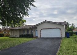 Foreclosure in  NW 24TH CT Pompano Beach, FL 33065