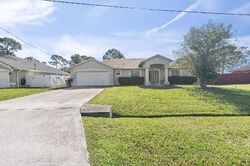 Foreclosure in  NW NORTH MACEDO BLVD Port Saint Lucie, FL 34983