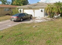 Foreclosure in  SE 23RD TER Cape Coral, FL 33990