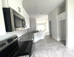 Foreclosure in  Krenson Bay Loop Winter Haven, FL 33881