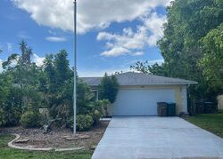 Foreclosure in  SE 15TH ST Cape Coral, FL 33990