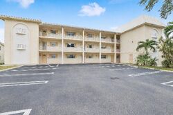 Foreclosure in  NW 38th Drive #103 Pompano Beach, FL 33065