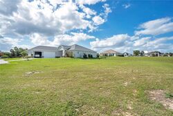 Foreclosure in  Snowy Orchid Way #168 Lake Alfred, FL 33850
