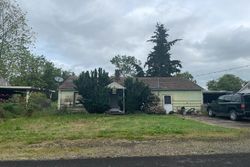 Pre-foreclosure in  WOOD AVE Eugene, OR 97402