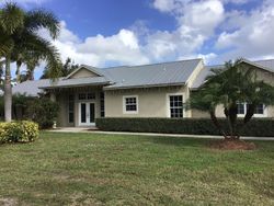 Pre-foreclosure Listing in SW SPRUCE ST PALM CITY, FL 34990