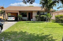 Pre-foreclosure in  NW 7TH ST Hallandale, FL 33009