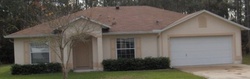 Pre-foreclosure in  SQUIRE CT Palm Coast, FL 32164