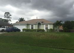 Pre-foreclosure Listing in SW ERIE ST PORT SAINT LUCIE, FL 34953