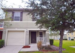 Pre-foreclosure Listing in TEA ROSE WAY ORLANDO, FL 32824