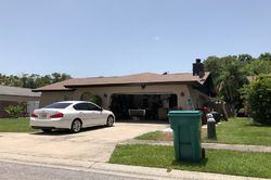 Pre-foreclosure in  E GROVEHILL RD Palm Harbor, FL 34683