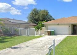 Pre-foreclosure in  NW 15TH PL Cape Coral, FL 33993