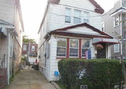 Pre-foreclosure Listing in 86TH ST WOODHAVEN, NY 11421