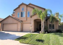 Pre-foreclosure in  E CARNOUSTIE AVE Fresno, CA 93730