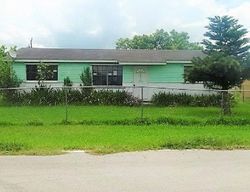 Pre-foreclosure Listing in EILON AVE SOUTH BAY, FL 33493