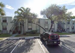 Pre-foreclosure in  NW 18TH ST  Pompano Beach, FL 33063