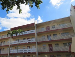 Pre-foreclosure in  COUNTRY CLUB DR  Pompano Beach, FL 33063