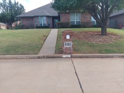 Pre-foreclosure in  WOODCREEK DR Oklahoma City, OK 73122