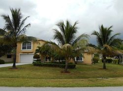 Pre-foreclosure in  SE SINBAD AVE Port Saint Lucie, FL 34952