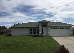 Pre-foreclosure in  DAUPHINE AVE S Lehigh Acres, FL 33974