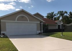 Pre-foreclosure in  SE BREVARD AVE Port Saint Lucie, FL 34952