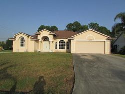 Pre-foreclosure in  SW HURTIG CT Port Saint Lucie, FL 34983