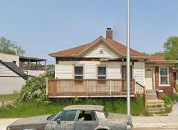 Pre-foreclosure in  DOUGLAS AVE Racine, WI 53402
