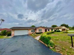 Pre-foreclosure in  NW 105TH AVE Pompano Beach, FL 33065