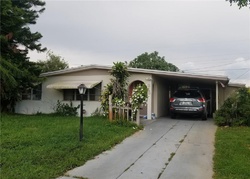Pre-foreclosure in  CANYON DR N Lehigh Acres, FL 33936