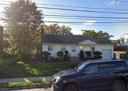 Pre-foreclosure in  URBAN AVE Westbury, NY 11590