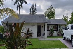Pre-foreclosure in  SW 210TH ST Miami, FL 33177