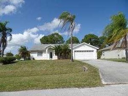 Pre-foreclosure in  SW GRANT AVE Port Saint Lucie, FL 34953