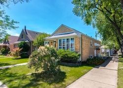 Pre-foreclosure in  S NEENAH AVE Chicago, IL 60638