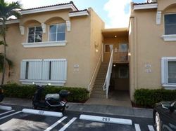 Pre-foreclosure in  NW 114TH AVE UNIT 205 Miami, FL 33178