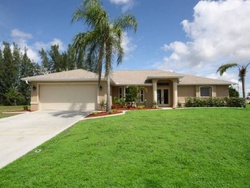 Pre-foreclosure in  NW 11TH TER Cape Coral, FL 33993