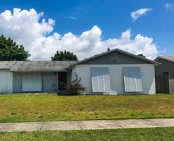 Pre-foreclosure in  SW 256TH TER Homestead, FL 33032