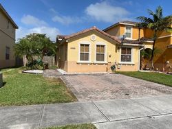 Pre-foreclosure Listing in SW 244TH TER HOMESTEAD, FL 33032