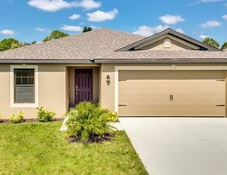 Pre-foreclosure in  CENTER LAKE ST Lehigh Acres, FL 33974