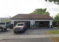 Pre-foreclosure in  W LAKE DR Hialeah, FL 33015