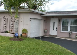 Pre-foreclosure in  NW 25TH ST Fort Lauderdale, FL 33322